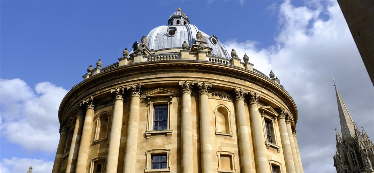Radcliffe Camera at the University of Oxford beneath a blue sky